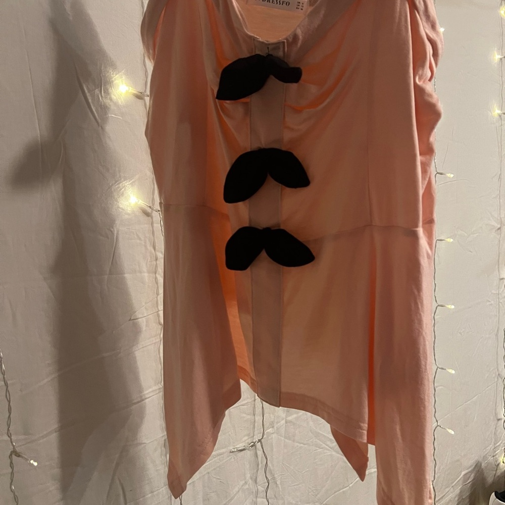 Pink Sleeveless Top with Black Bow Accents